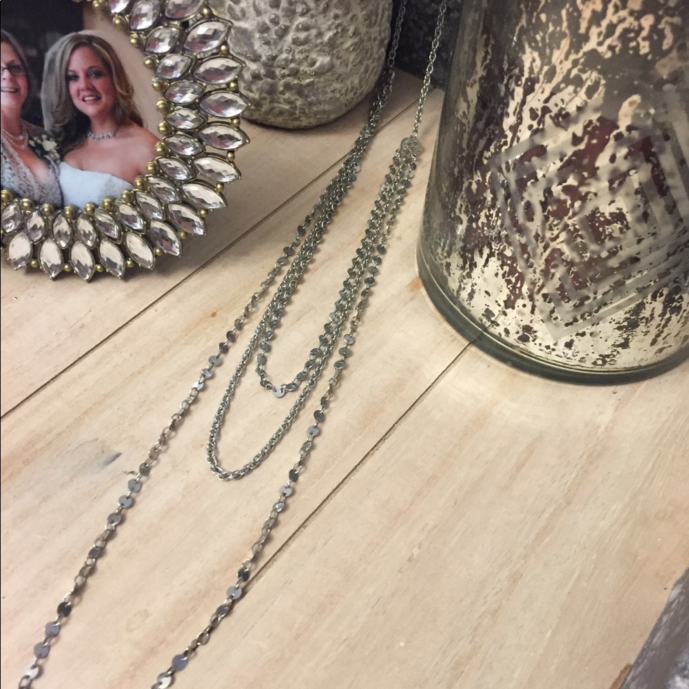 Multi-strand silver toned necklace